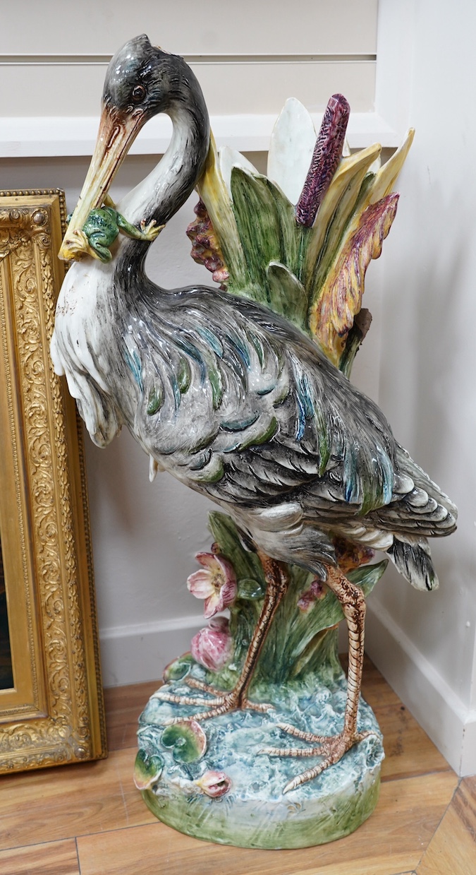 A French decorative majolica 'Stork' stick stand, 100cm high. Condition - damage to head feathers